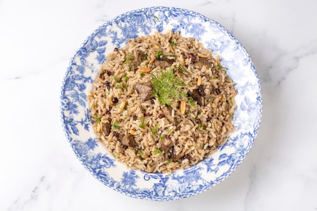 Traditional delicious Turkish food; rice pilaf with pine nuts and currants (Turkish name; ic pilav or pilaf)