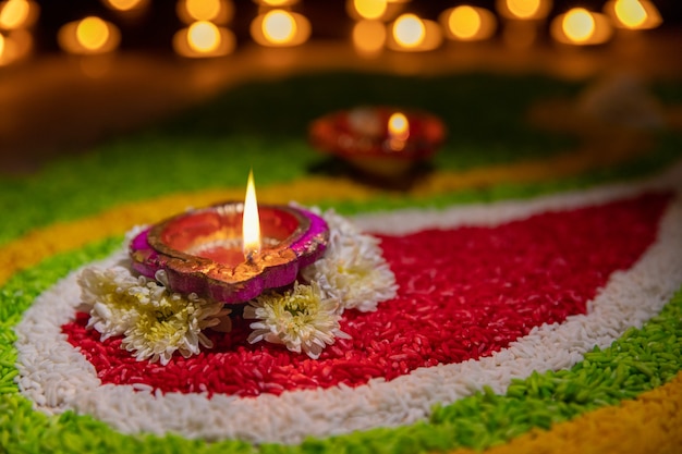 Traditional diya lamps lit during diwali celebration