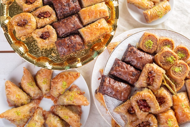 Traditional eastern arabic dessert Baklava with Turkish honey and walnuts, selective focus. Copy space