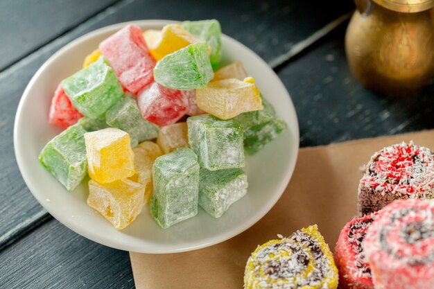 Traditional eastern desserts on wooden background