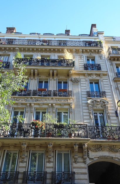 The traditional facade of Parisian building France