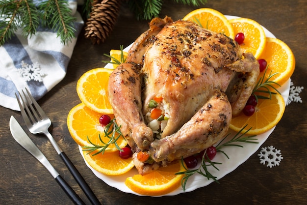 Traditional festive food for Christmas Christmas turkey stuffed with rice and vegetables