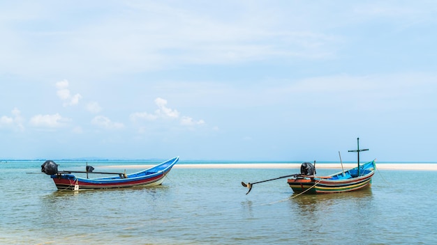 Traditional fishing boats on seaside with blue sky summer season