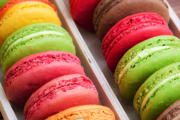 Traditional french colorful macarons in a box