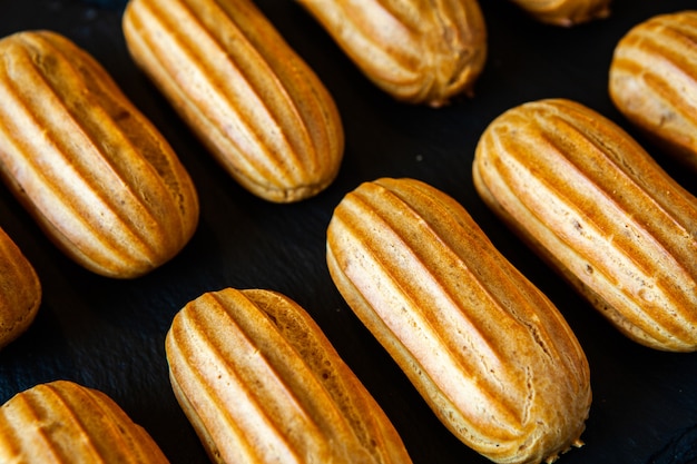 Traditional french eclairs with chocolate