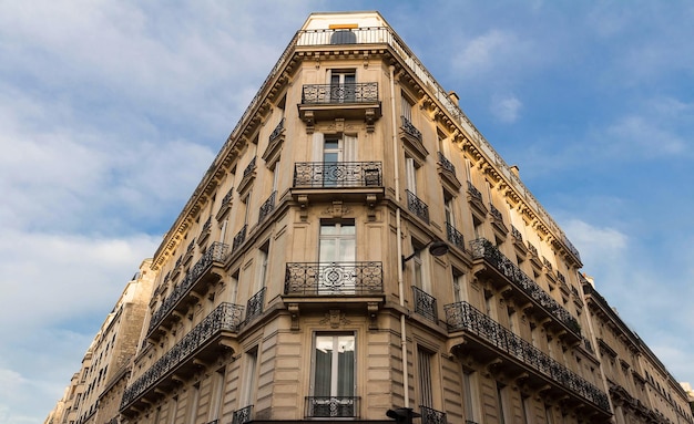 Traditional French house with typical balconies and windows Paris