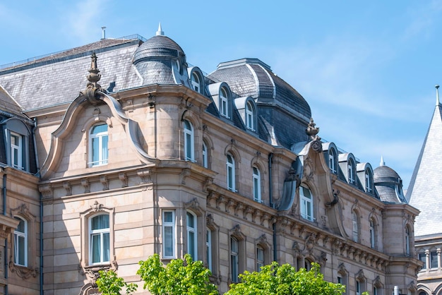 Traditional french residental building facade of the stone house in France