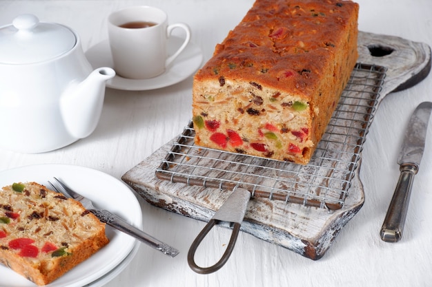 Traditional fruit cake  pudding with dried fruits on white