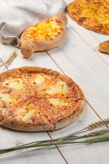 Traditional Georgian bread  khachapuri on the table Homemade baking