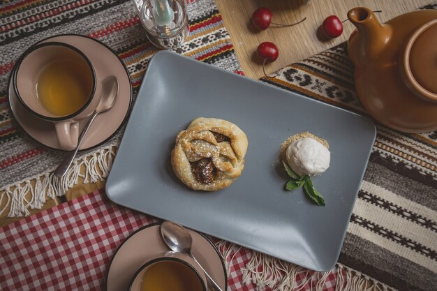 Traditional Georgian sweets and desserts with hazelnuts, walnuts, grape juice, honey, chocolate. Baklava, nakhini, churchkhela. Fresh fruits and candied fruits. Traditional Turkish coffee.