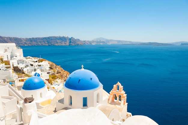 Traditional greek church and white architecture on Santorini island, Greece. Famous travel destination