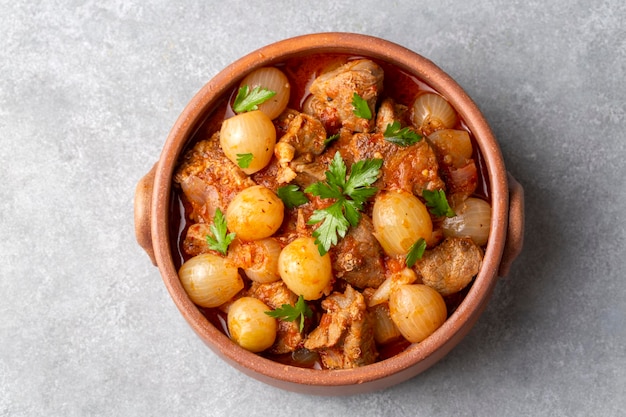 Traditional Greek dish of beef stifado in a sauce. Meat stew, onion stew. Turkish name; sogan yahni or et yahni