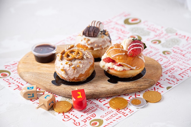 Traditional Hanukkah donuts, Spinning tops, chocolate coins.