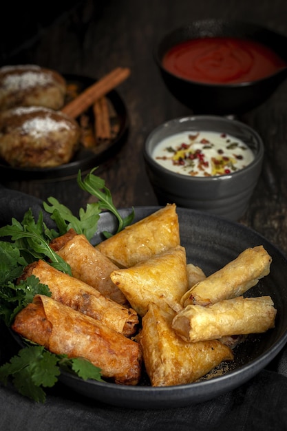 Traditional homemade assortment of moroccan food snacks on dark background. Typical Arab food. Halal concept