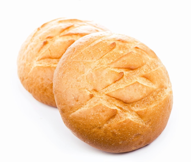 Traditional homemade round bread isolated on a white background