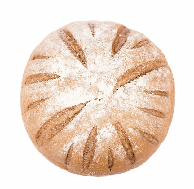 Traditional homemade round bread isolated on a white background