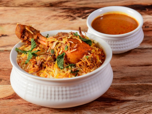 Traditional Hyderabadi Chicken dum Biryani made of Basmati rice cooked with masala spices