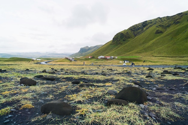 Traditional icelandic buildings near Reynisfjara black beach Vik Reynisdrangar Southern Iceland