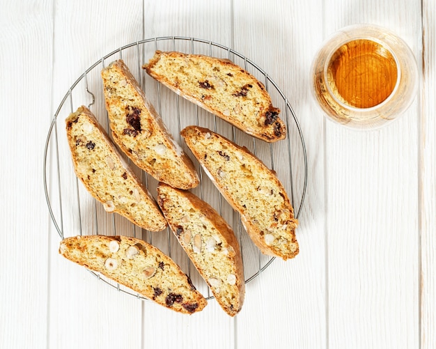 Traditional Italian almond cantuccini cookies and sweet wine Vin Santo. Homemade sweet dessert biscotti