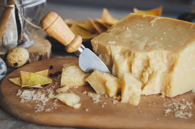 Traditional italian food - aged Italian parmesan hard cheese. 