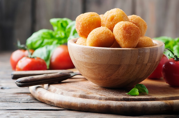 Traditional italian fried balls of mozzarella