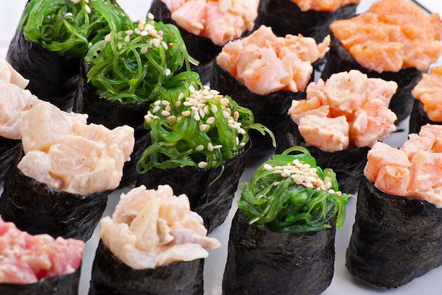 Traditional Japanese food Sushi Closeup japanese sushi on a white plate Sushi set