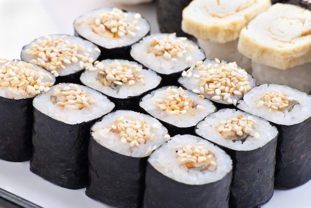 Traditional Japanese food Sushi Closeup japanese sushi on a white plate Sushi set