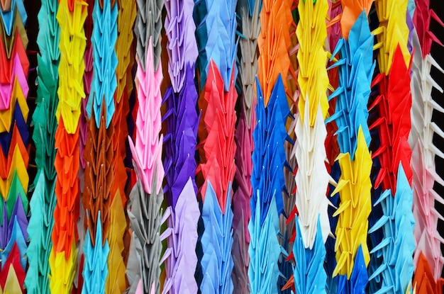 Traditional Japanese Thousand origami cranes for japan call Senbazuru pray with god for instead of just one wish such as long life or recovery from illness or injury at Fushimi Inari taisha shrine