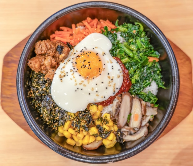 Traditional Korean Bibimbap with Sunny Side Up Egg