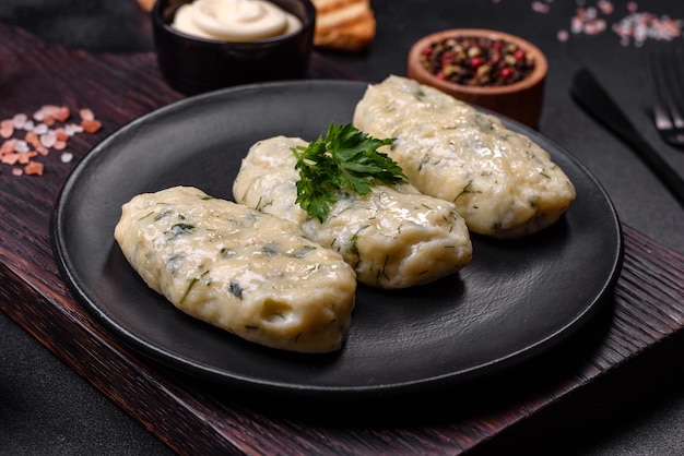 Traditional Lithuanian dish zeppelin boiled potato dumplings stuffed with minced meat