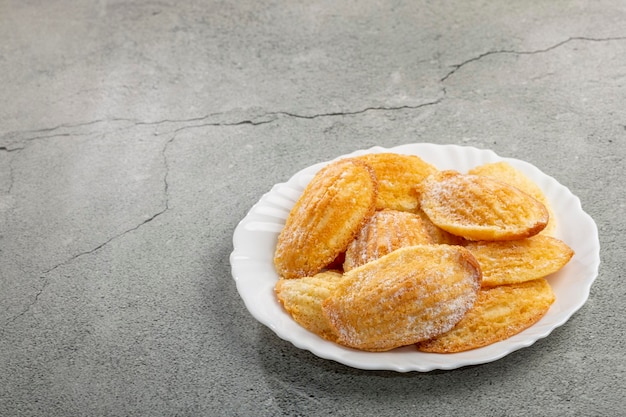 Traditional madeleines with sprinkled sugar