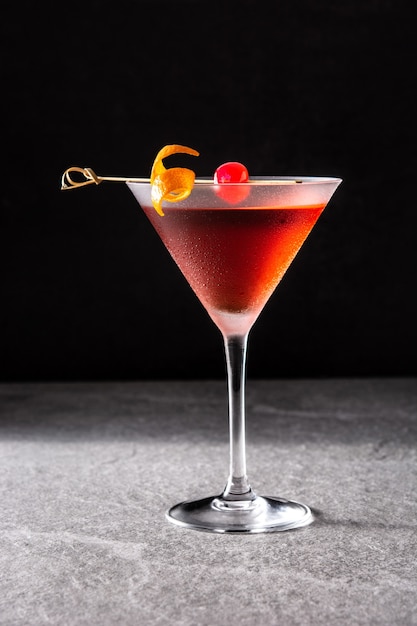 Traditional Manhattan cocktail with cherry