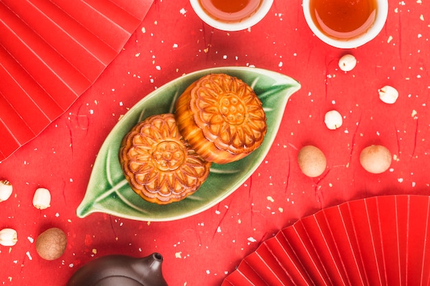 Traditional mooncakes on table with teacup