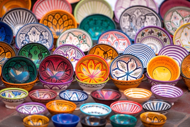 Traditional Moroccan souvenir plates at a street market bazaar in Medina district in Morocco