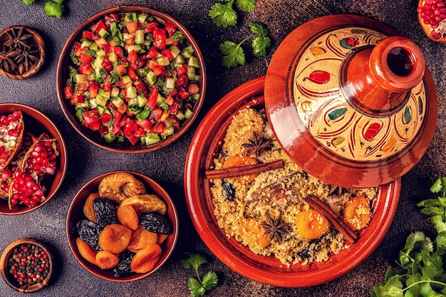 Traditional moroccan tajine of chicken with dried fruits and spices