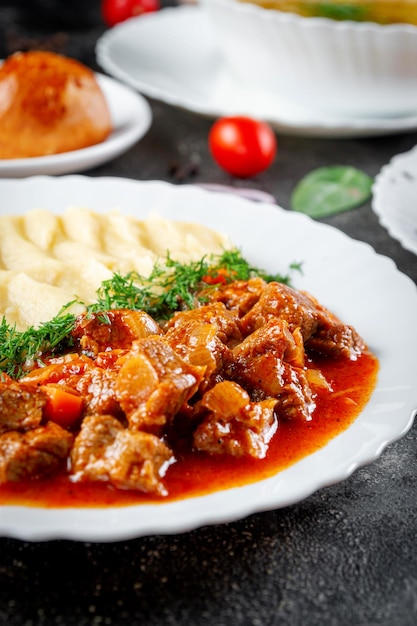 Traditional National Kazakh dishes Kazakh borscht beet salad with walnuts xACooked from beef or lamb