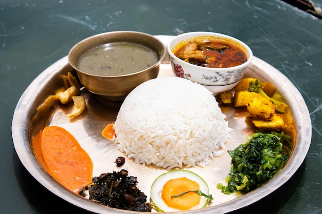 Traditional Nepali Thakali Dish of Rice Lentils Curry and Chutney aka Daal Bhaat and Tarkari