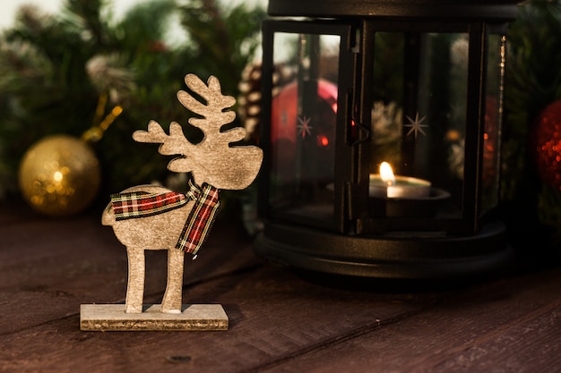 Traditional New Year's decorations. Background for a Christmas card.wooden deer.