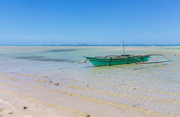 Traditional Philippino boat in the sea, Palawan island, Philippines