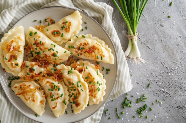 Traditional Polish Pierogi with Fried Onions and Chives on Rustic Background