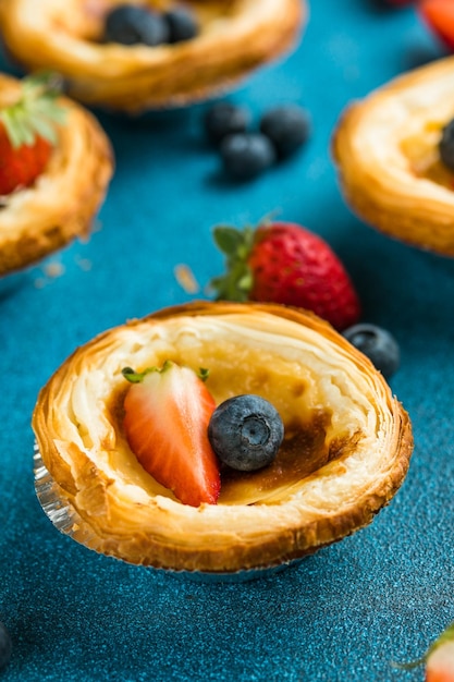 Traditional Portuguese egg tart dessert Pasteis Pastel de nata or Pasteis de Belemv