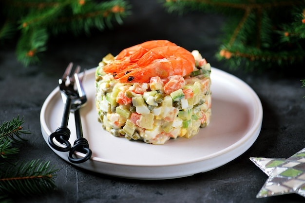 Traditional Russian festive salad Olivier with shrimps