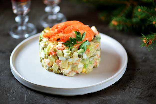 Traditional Russian festive salad Olivier with shrimps