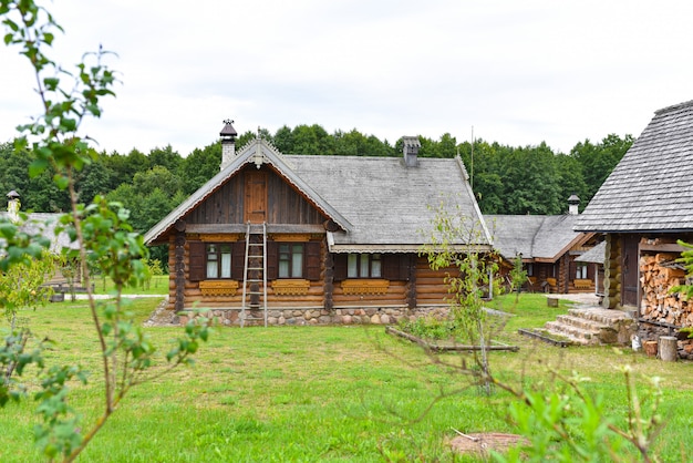 Traditional Russian wooden house with a garden