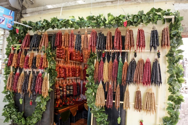 Traditional sausageshaped candies with walnut in it