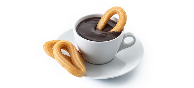 Traditional Spanish churros with hot chocolate isolated on white background