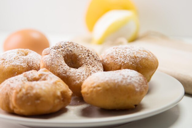 Traditional Spanish fried donuts made with lemon and cinnamon.