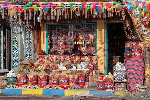 Traditional spices bazaar with herbs and spices for sale to tourists in street old market in Sharm El Sheikh, Egypt, close up