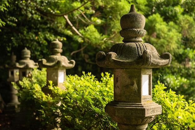 Traditional stone lantern in Japanese temple garden.