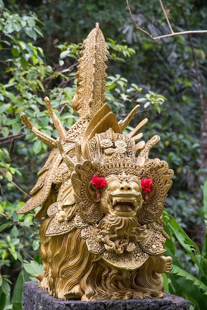 Traditional stone sculpture in garden Island Bali Ubud Indonesia